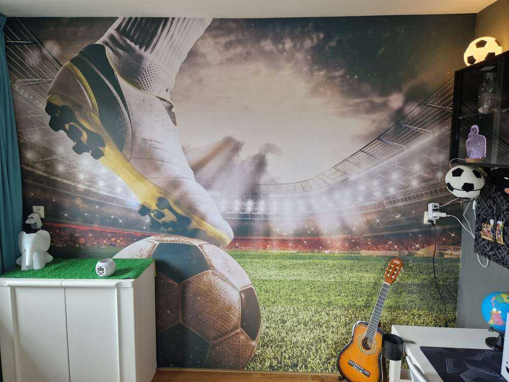 Jugador de fútbol en el estadio