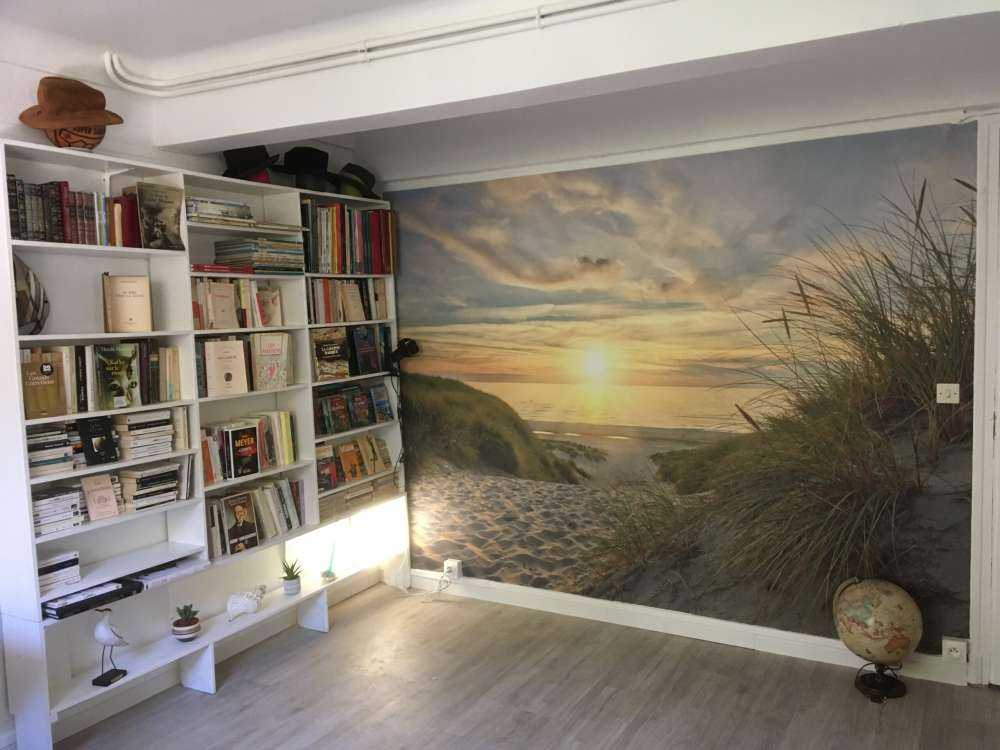Puesta de sol en la playa de dunas