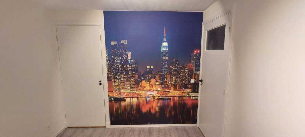 Empapelado del horizonte de Nueva York por la noche