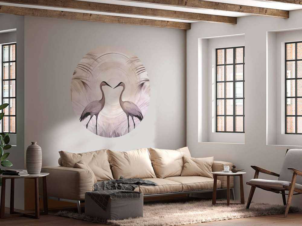 Grúas al atardecer gris