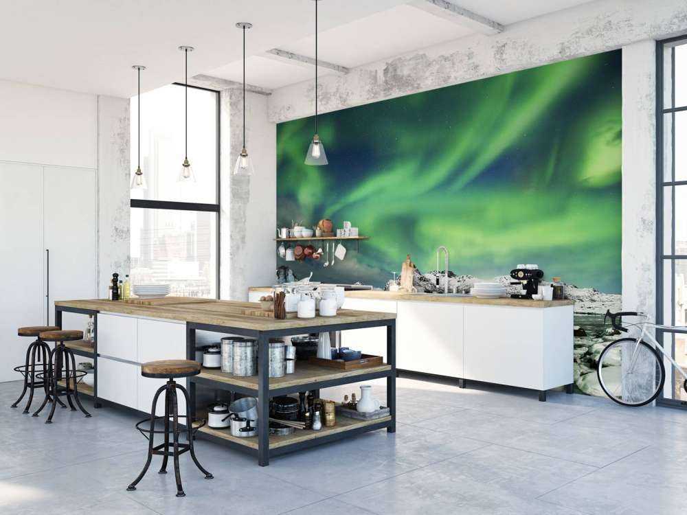 Aurora boreal sobre un paisaje invernal