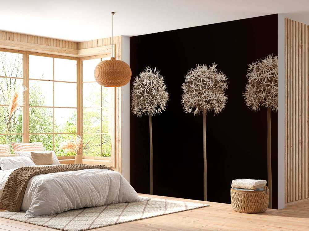 Tres flores de allium en fila