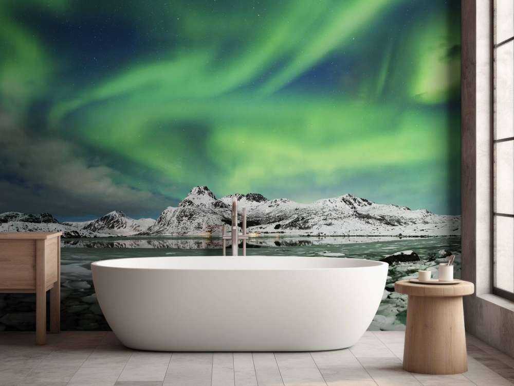 Aurora boreal sobre un paisaje invernal