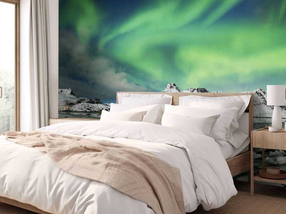 Aurora boreal sobre un paisaje invernal
