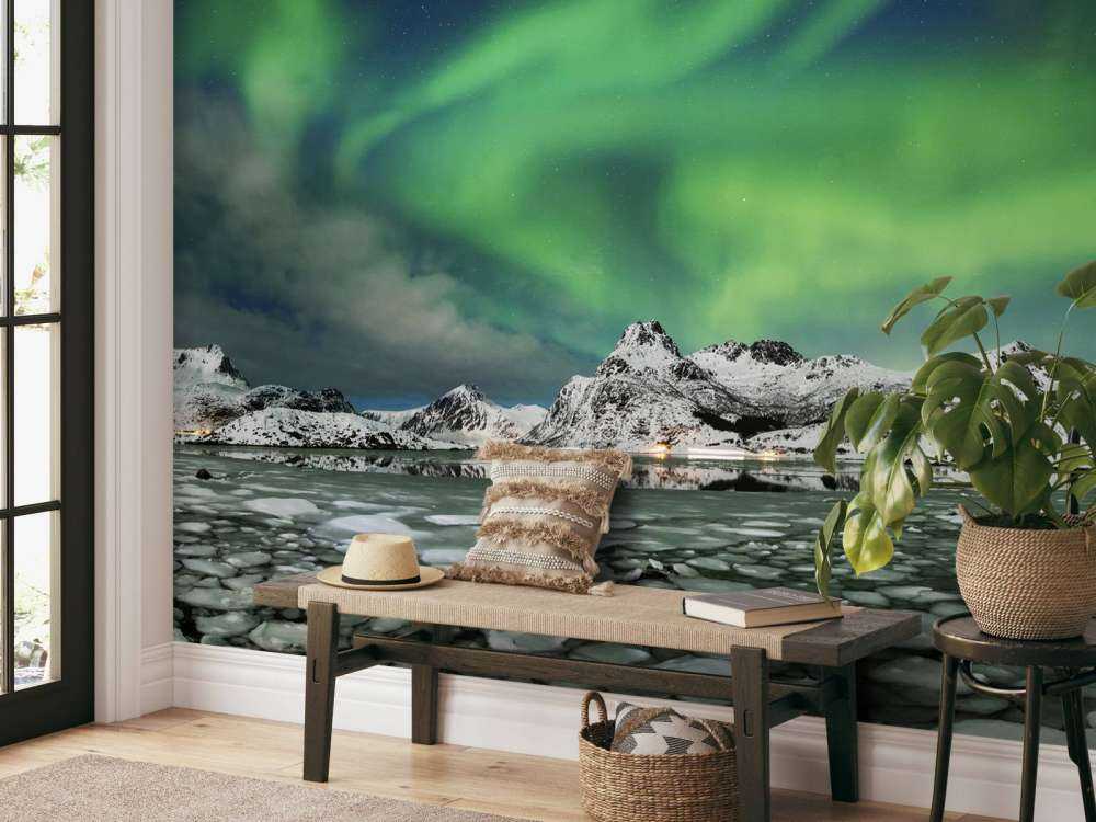 Aurora boreal sobre un paisaje invernal
