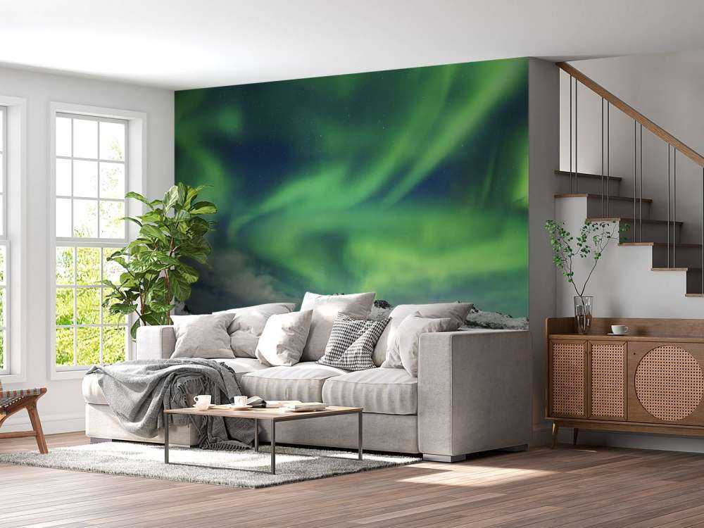 Aurora boreal sobre un paisaje invernal