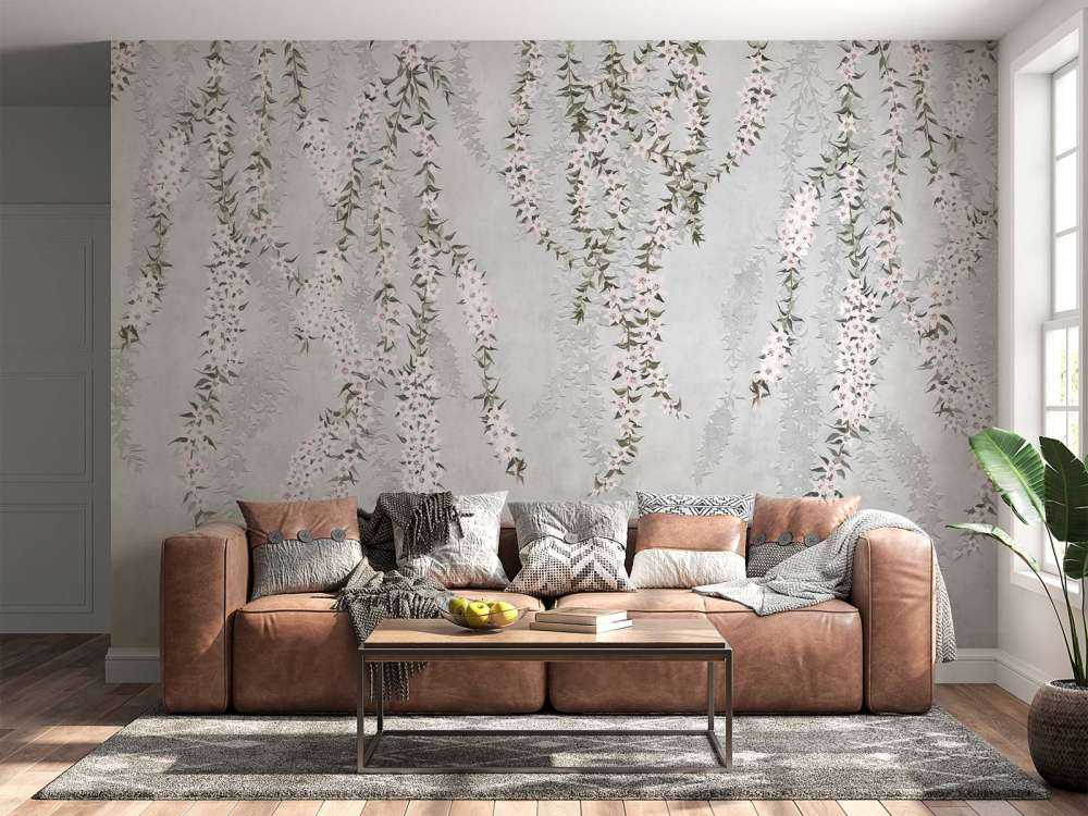 Ramas de flores sobre hormigón azul claro