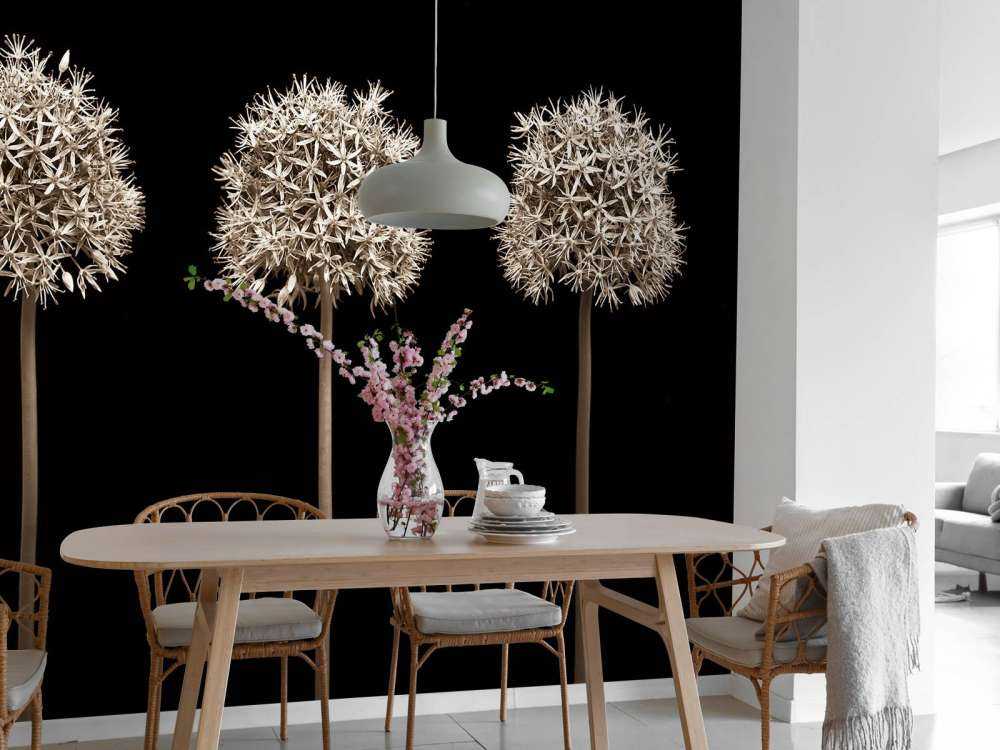Tres flores de allium en fila